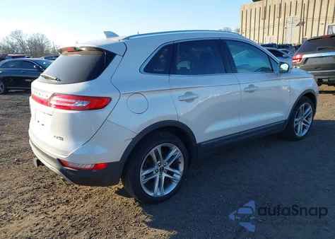 2015 Lincoln Mkc from USA, damaged, VIN 5LMTJ2AH7FUJ35142